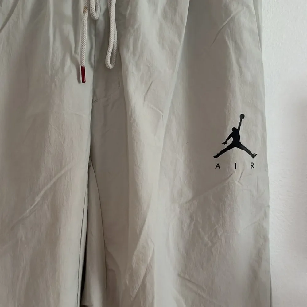 Jordan Cream Sweatpants with Jumpman Logo and Elastic Waistband